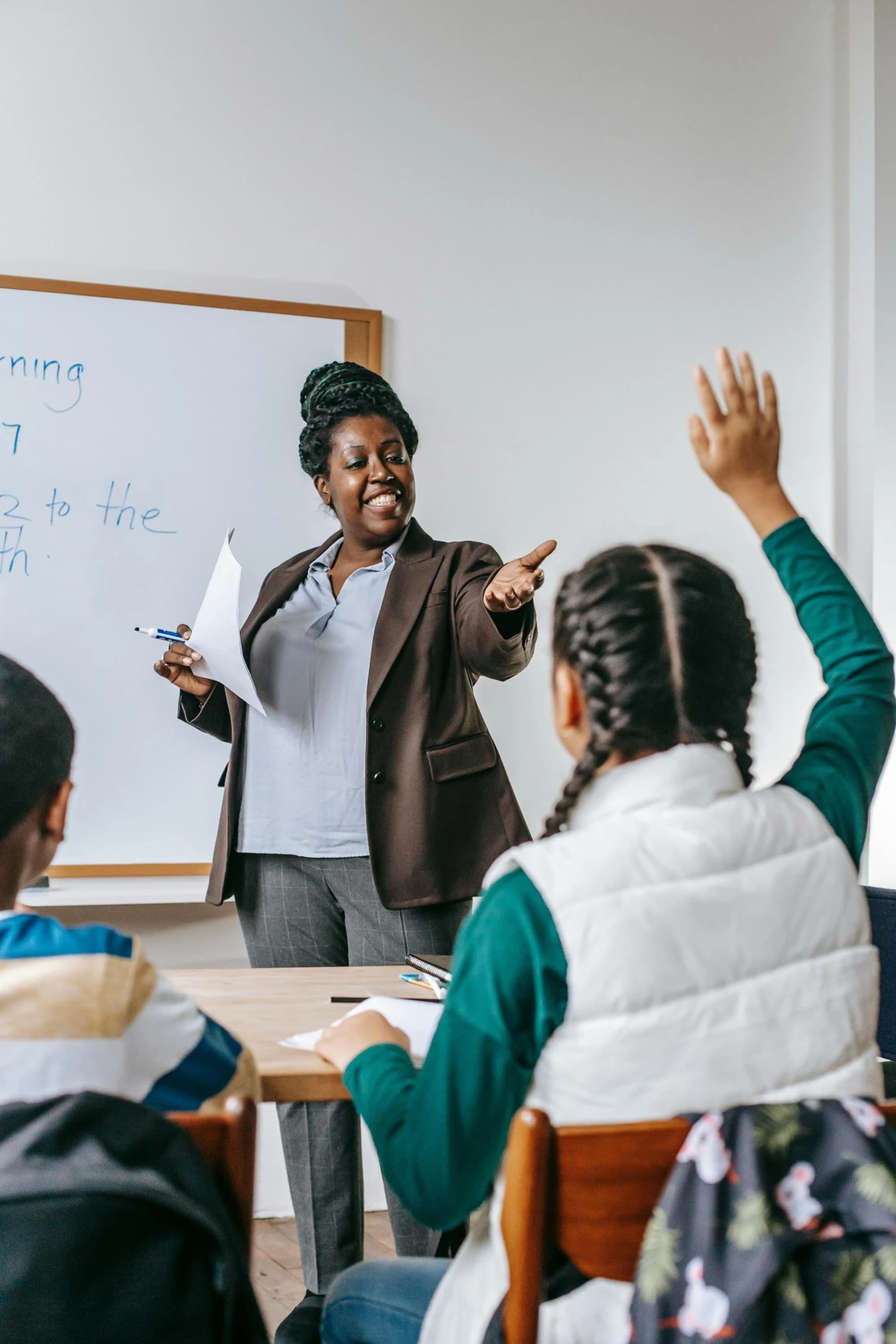 A teacher working with students